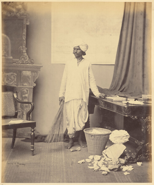Studio-portrait-of-a-man-as-a-mehtar-or-a-sweeper---Circa-1860s.jpg