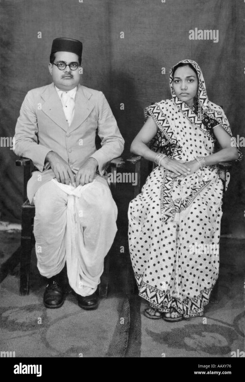 indian-couple-old-photo-sitting-on-chair-village-mahangwa-district-AAXY76.jpg