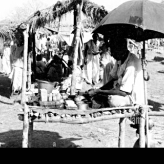 this-photograph-taken-in-1952-captures-a-shop-in-india-showcasing-EXHPB6